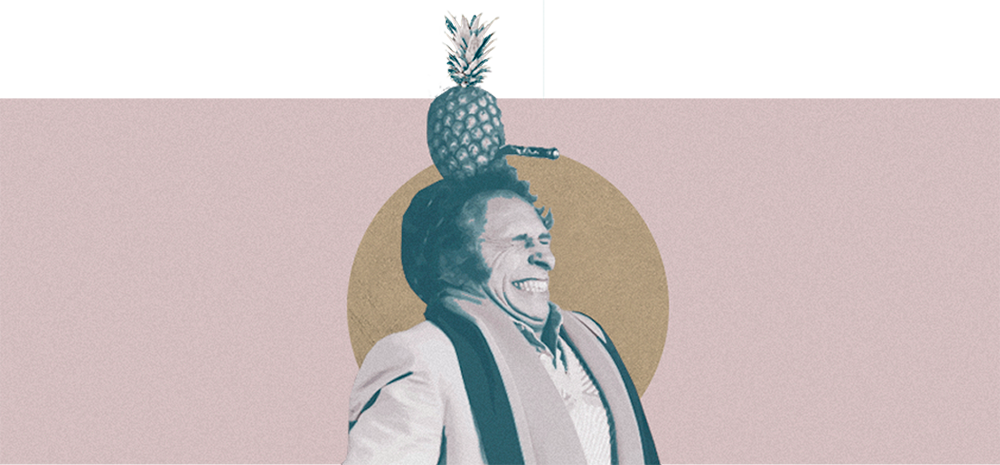 Homme avec un ananas sur la tête